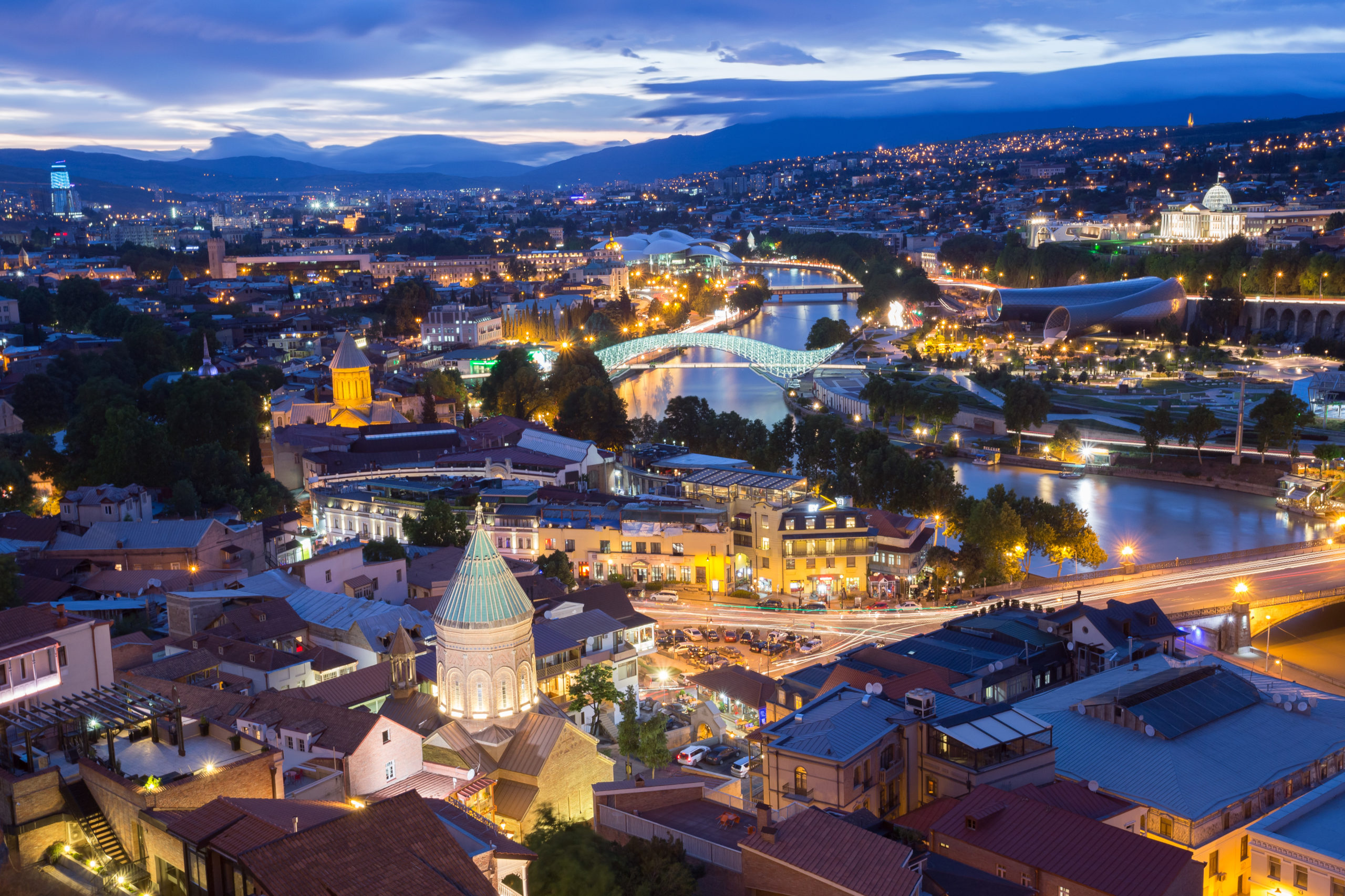 Scenic Top View Of Tbilisi Georgia In Evening Lights Illumination